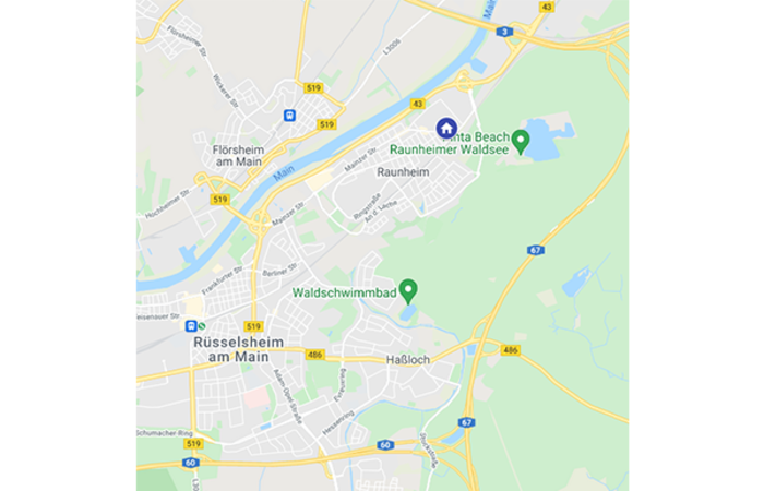 Eine Karte zeigt die Umgebung von Raunheim mit markierten Orten wie dem Raunheimer Waldsee und dem Waldschwimmbad.