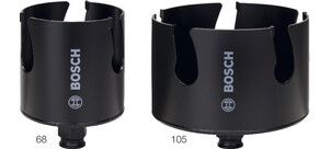 Zwei schwarze Lochsägen verschiedener Größen von Bosch.