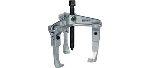 Ein dreibeiniger mechanischer Abzieher von Kukko, hergestellt in Deutschland, mit einem robusten, verstellbaren Design.