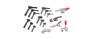 Verschiedene Spannverschlüsse und Hebel unterschiedlicher Größen und Formen.